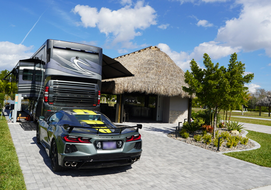 Large private Class A motorcoach site with tropical landscaping at Laguna Caribe.